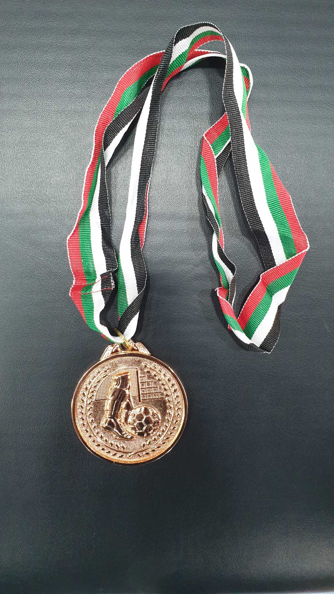 مدالية قدم برونزيه
